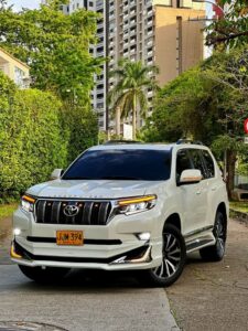 Cutaway view of a hybrid car engine showing electric motor, battery pack, and fuel engine working together.