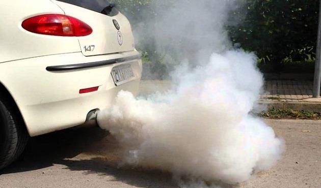 Thick white smoke from exhaust when starting car due to coolant leak